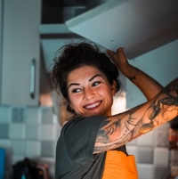 Portrait of Sophia R., bakery owner and Guanci customer